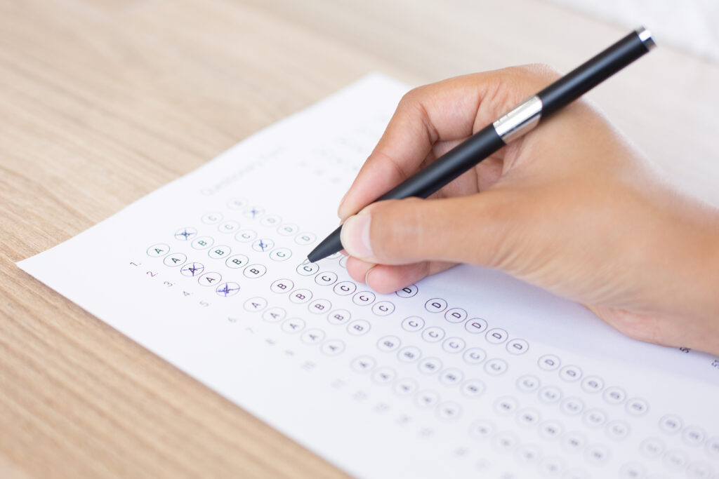 closeup-person-filling-out-questionary-form-1024x683